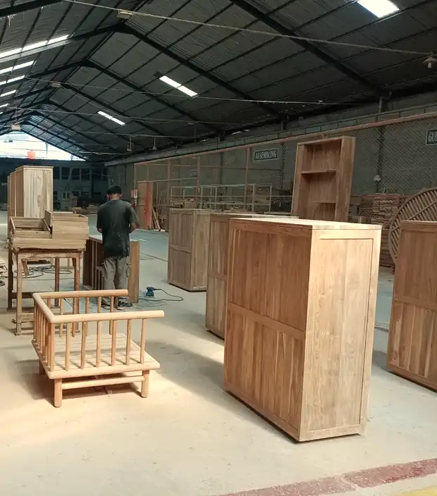 Casegoods and seating under assembly in the assembling bay