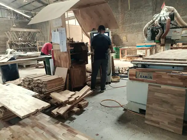 Operator at the CNC router in the machine shop